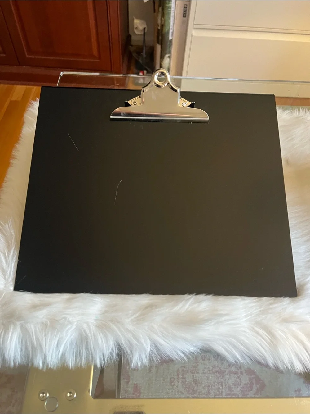 Black slatbpsrd with Silver Clip